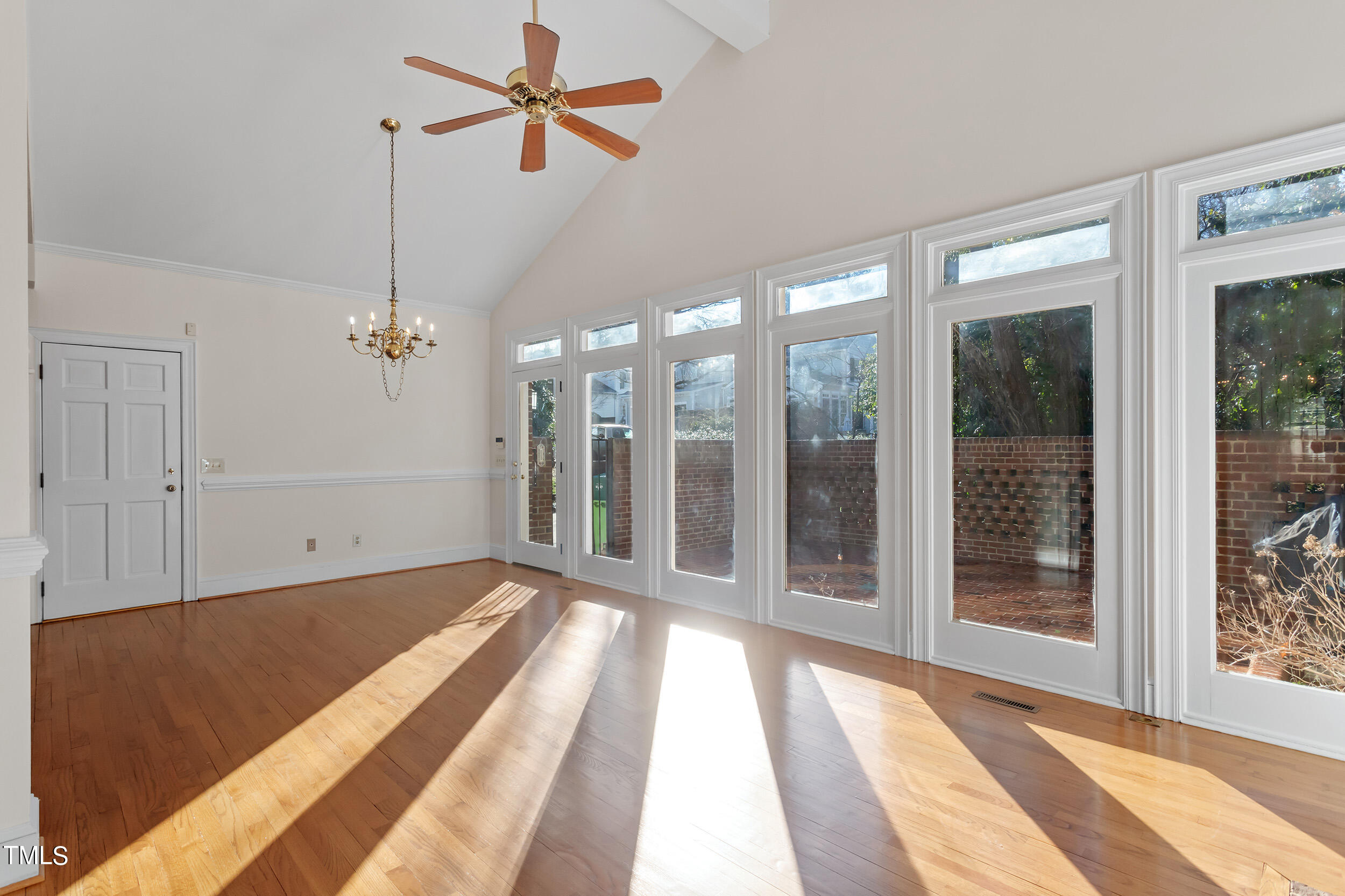 2617 Tatton Drive Raleigh, NC 27608 - Photo 16 of 41 a view of a room with a ceiling fan