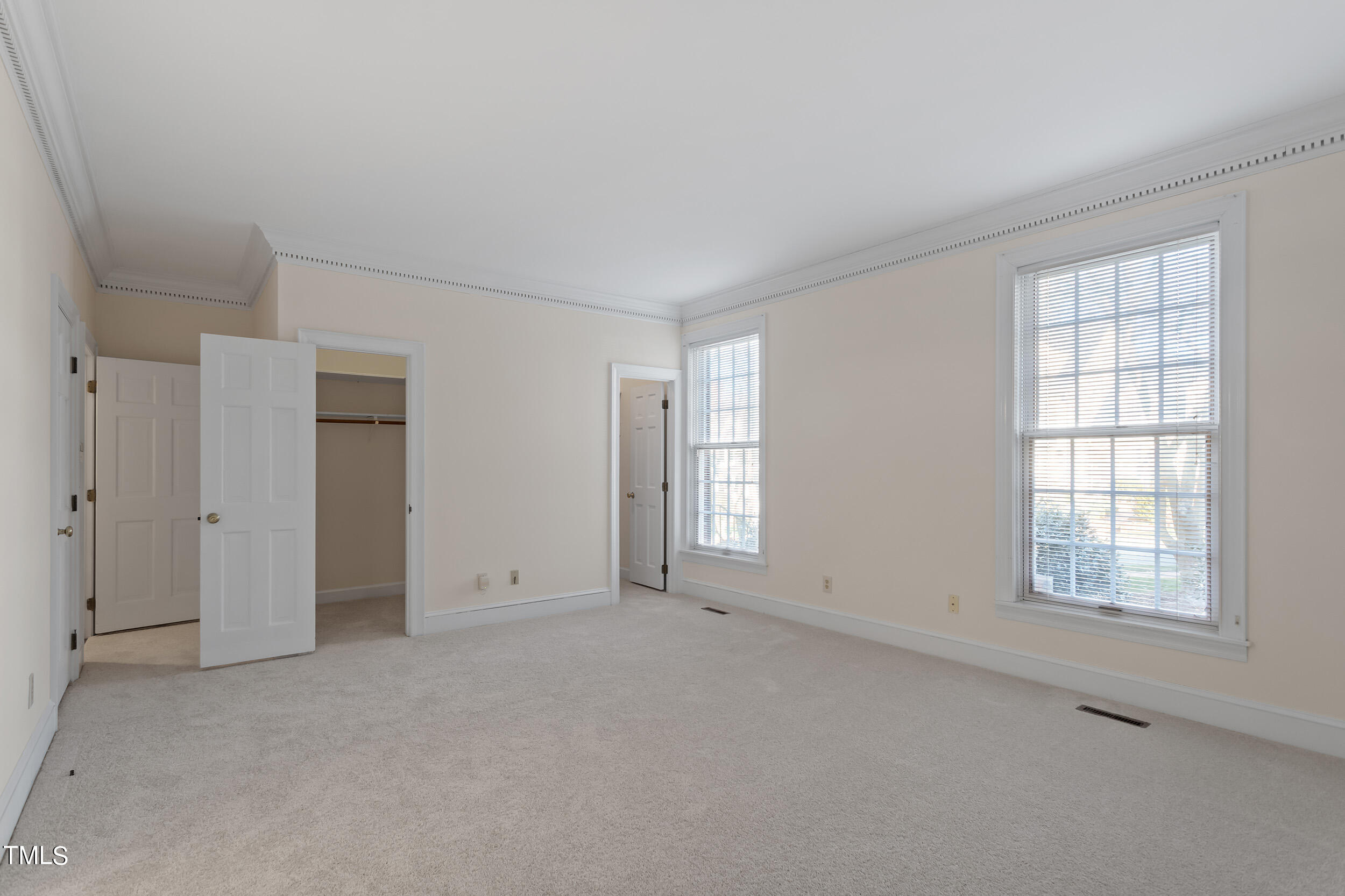 2617 Tatton Drive Raleigh, NC 27608 - Photo 23 of 41 an empty room with windows