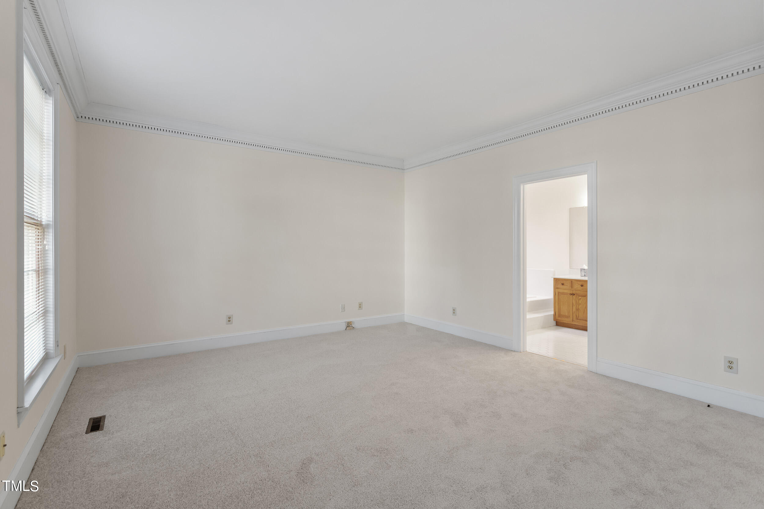 2617 Tatton Drive Raleigh, NC 27608 - Photo 24 of 41 an empty room with windows