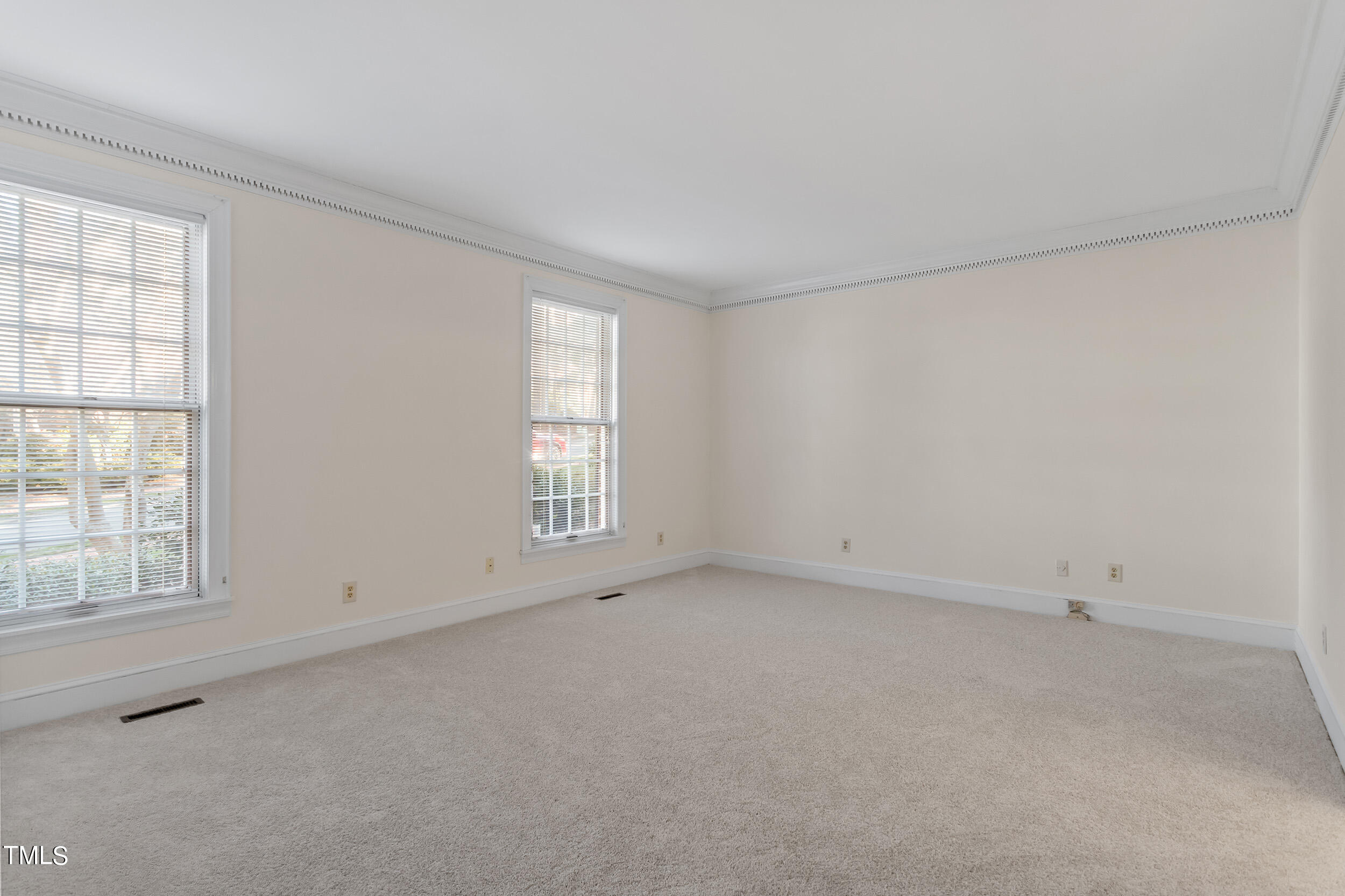 2617 Tatton Drive Raleigh, NC 27608 - Photo 25 of 41 an empty room with windows
