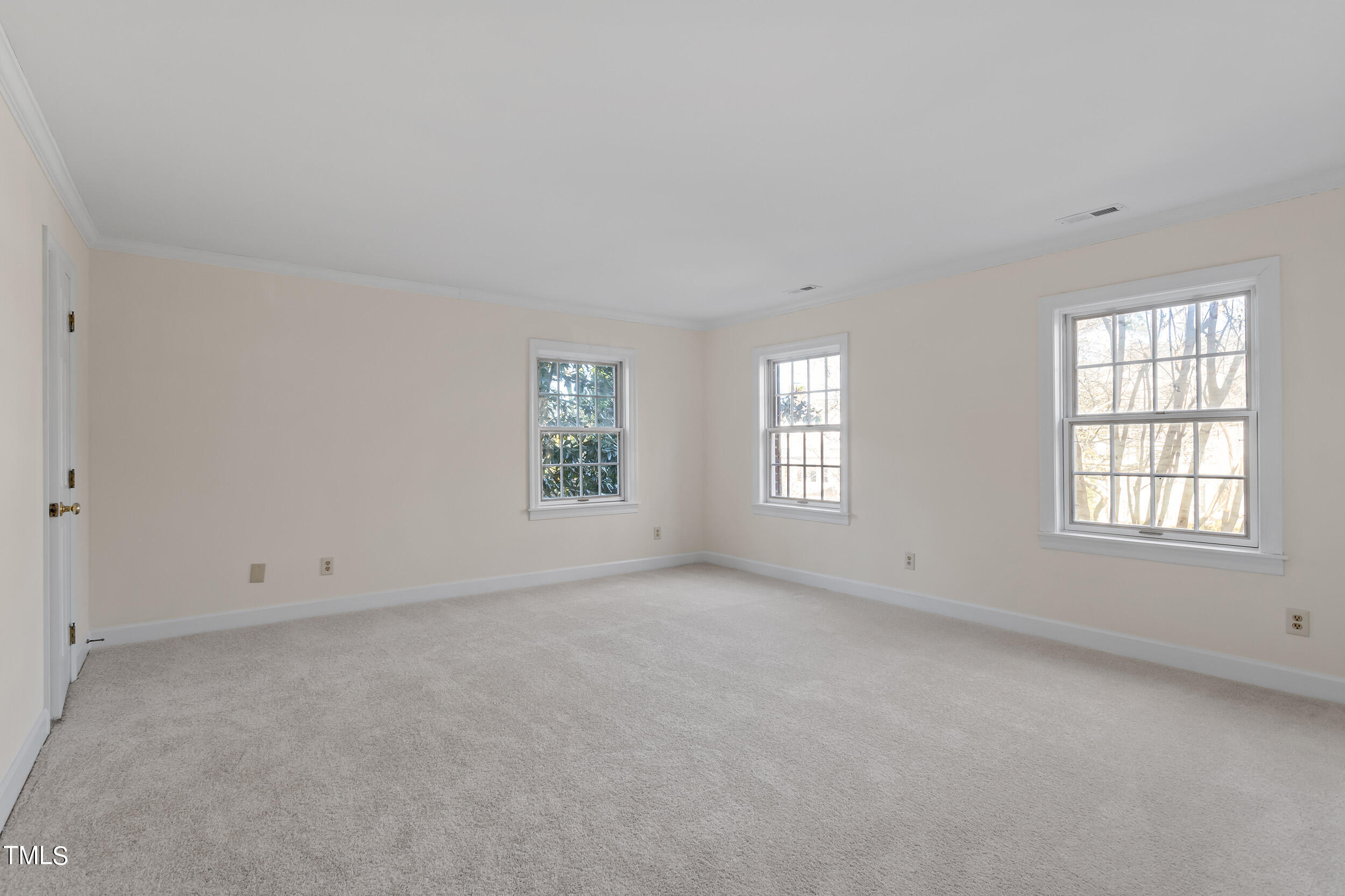 2617 Tatton Drive Raleigh, NC 27608 - Photo 30 of 41 an empty room with windows