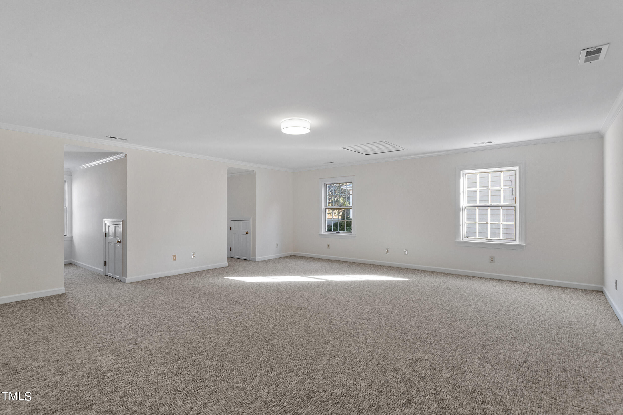 2617 Tatton Drive Raleigh, NC 27608 - Photo 40 of 41 a view of an empty room with a window
