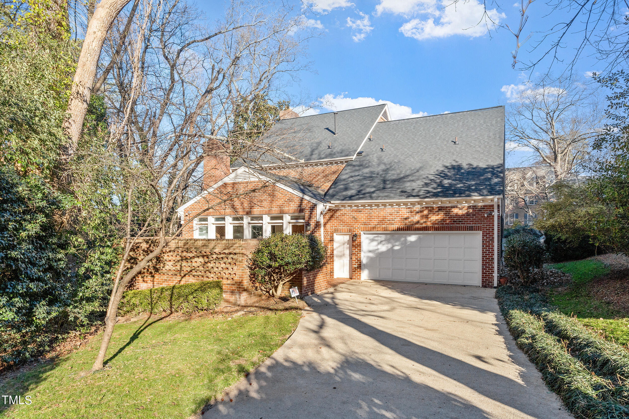 2617 Tatton Drive Raleigh, NC 27608 - Photo 4 of 41 a view of a house with a yard