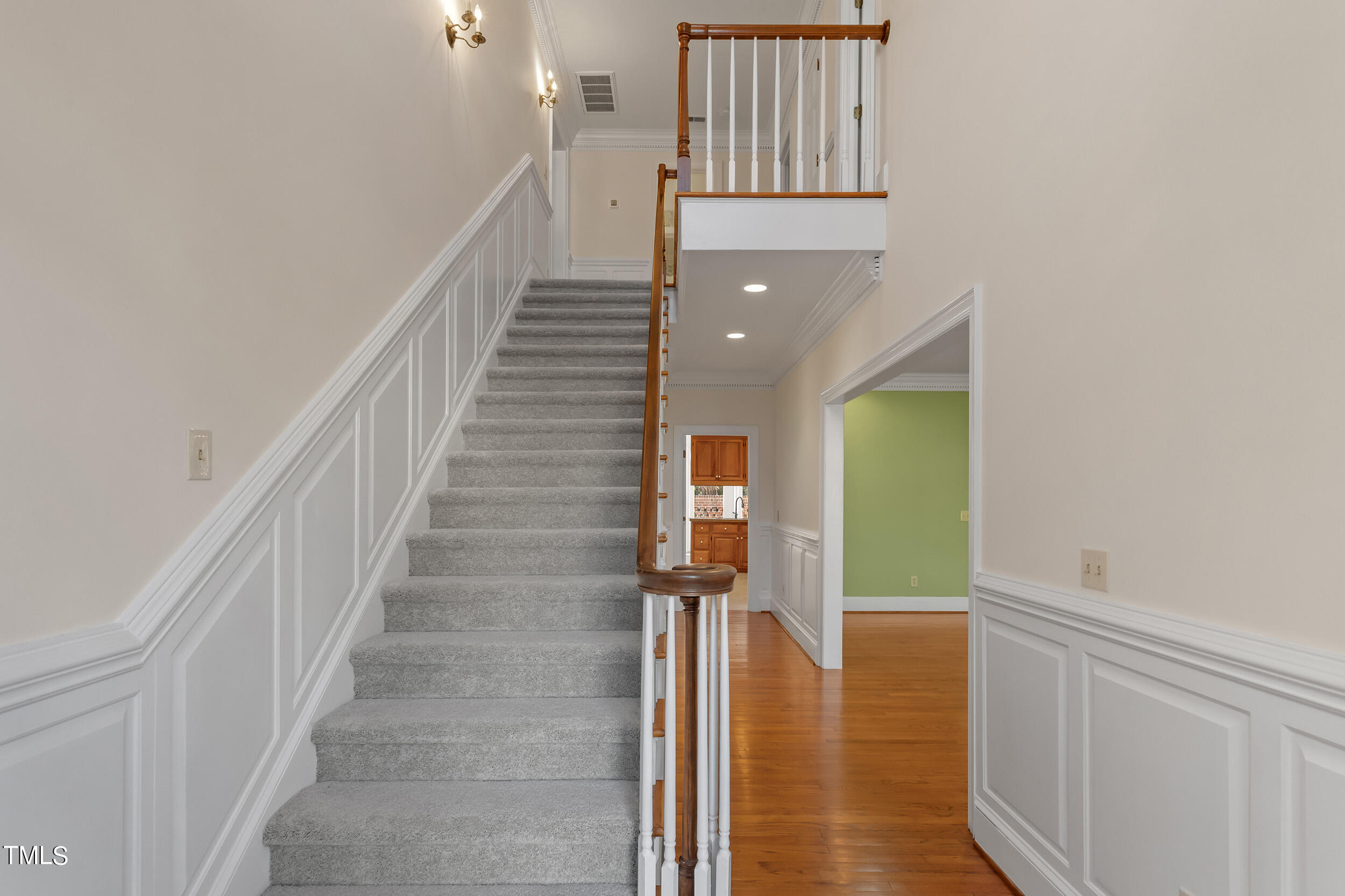 2617 Tatton Drive Raleigh, NC 27608 - Photo 7 of 41 a view of entryway and hall with wooden floor