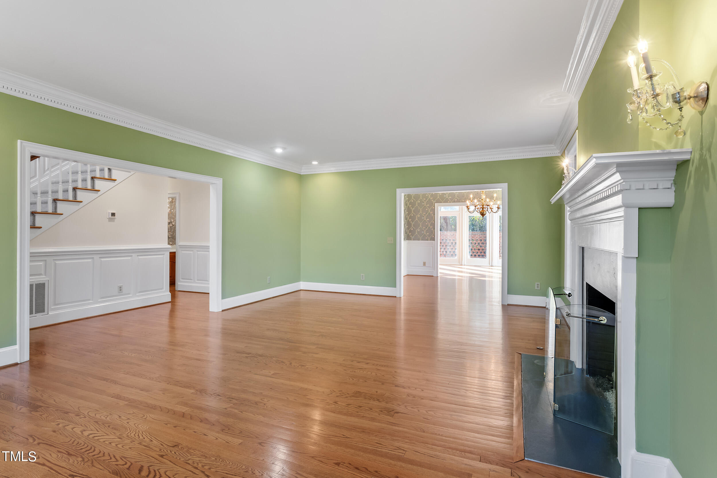 2617 Tatton Drive Raleigh, NC 27608 - Photo 10 of 41 a view of empty room with wooden floor