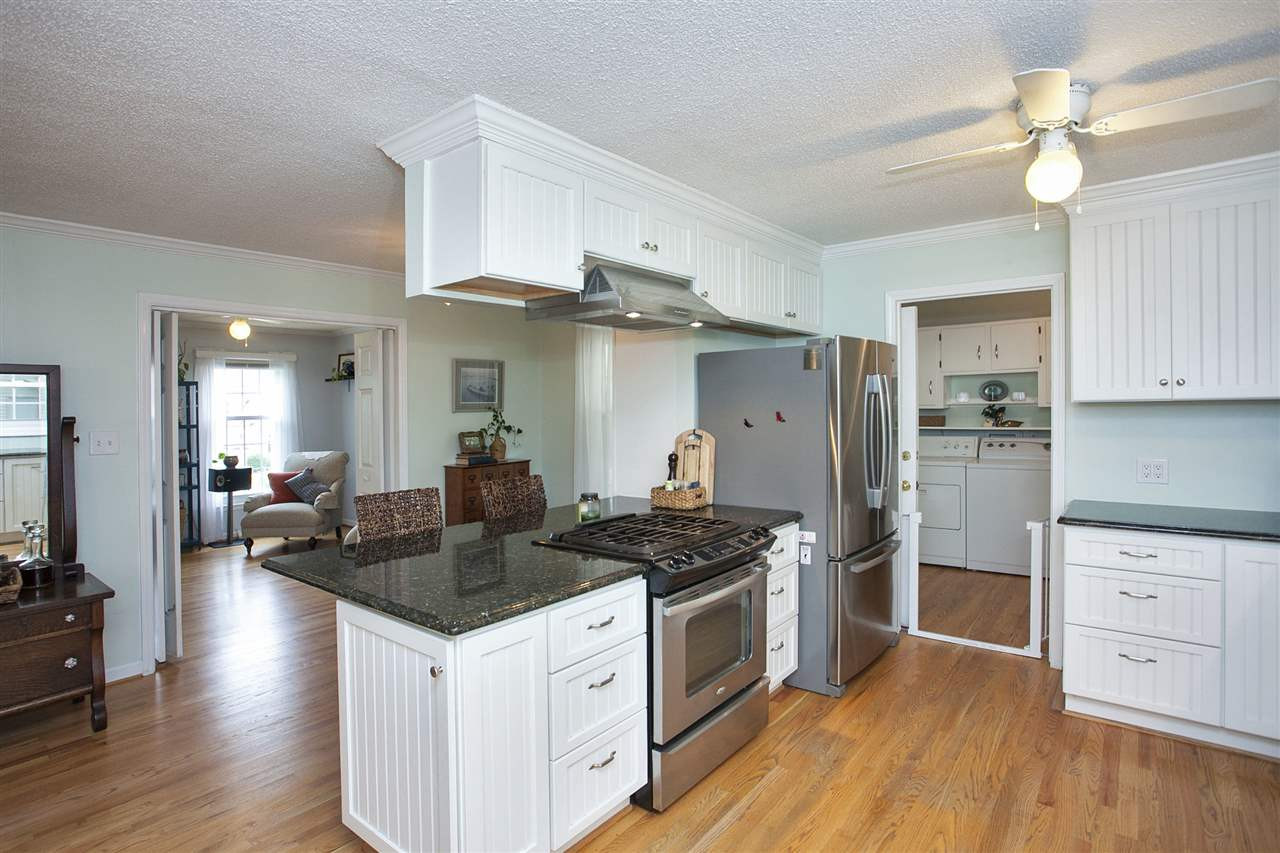 1901 French Drive Raleigh, NC 27612 - Photo 15 of 25 (14.8 x 11.4) View to Breakfast Area (14.8 x 5.5) and Living Room. Plenty of Kitchen Cabinets for the gourmet chef! Kitchen