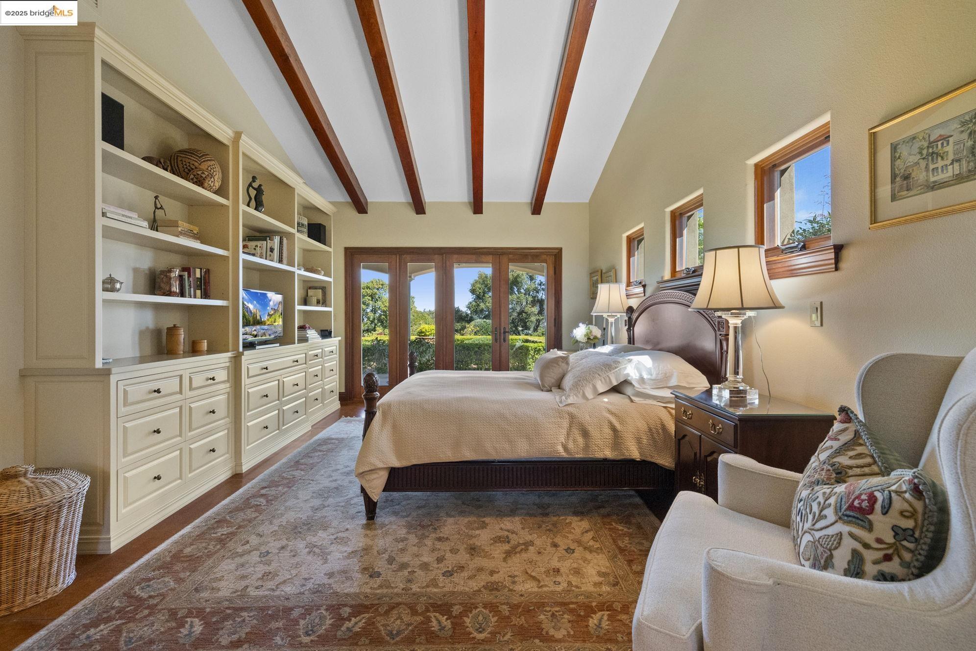 10270 Slate Rim Road Sonora, CA 95370 - Photo 25 of 55 a bed room with bed and a large window