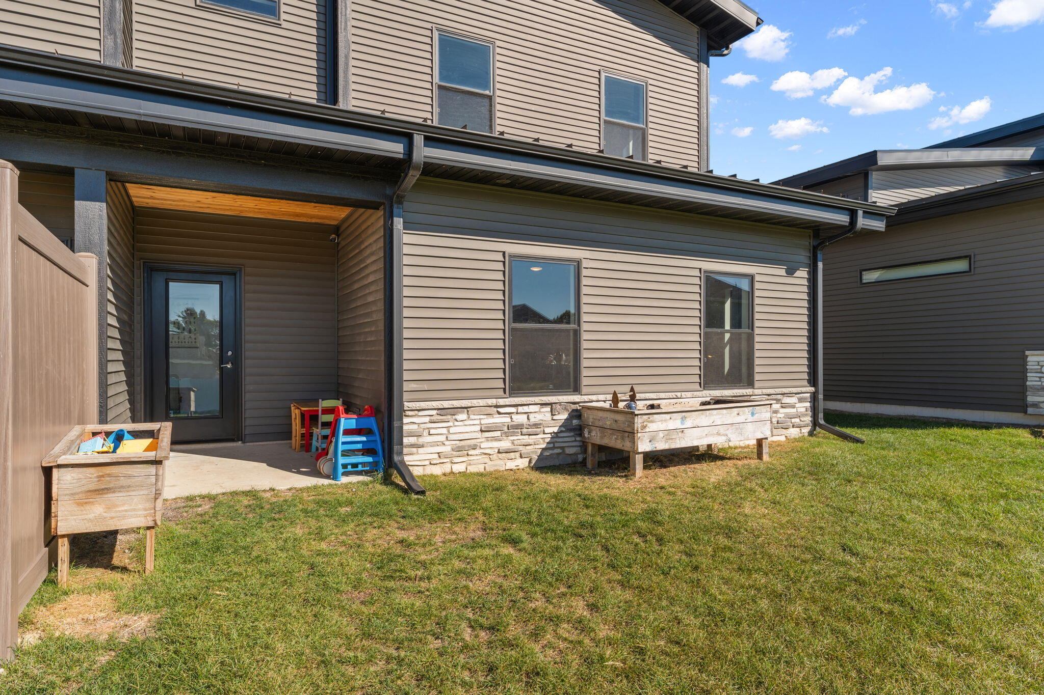 283 Nomo Place Crown Point, IN 46307 - Photo 32 of 35 a view of a house with patio