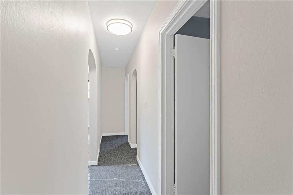 7872 Mt Carmel Road Verona, PA 15147 - Photo 24 of 50 Hallway from kitchen to bedrooms & bathroom