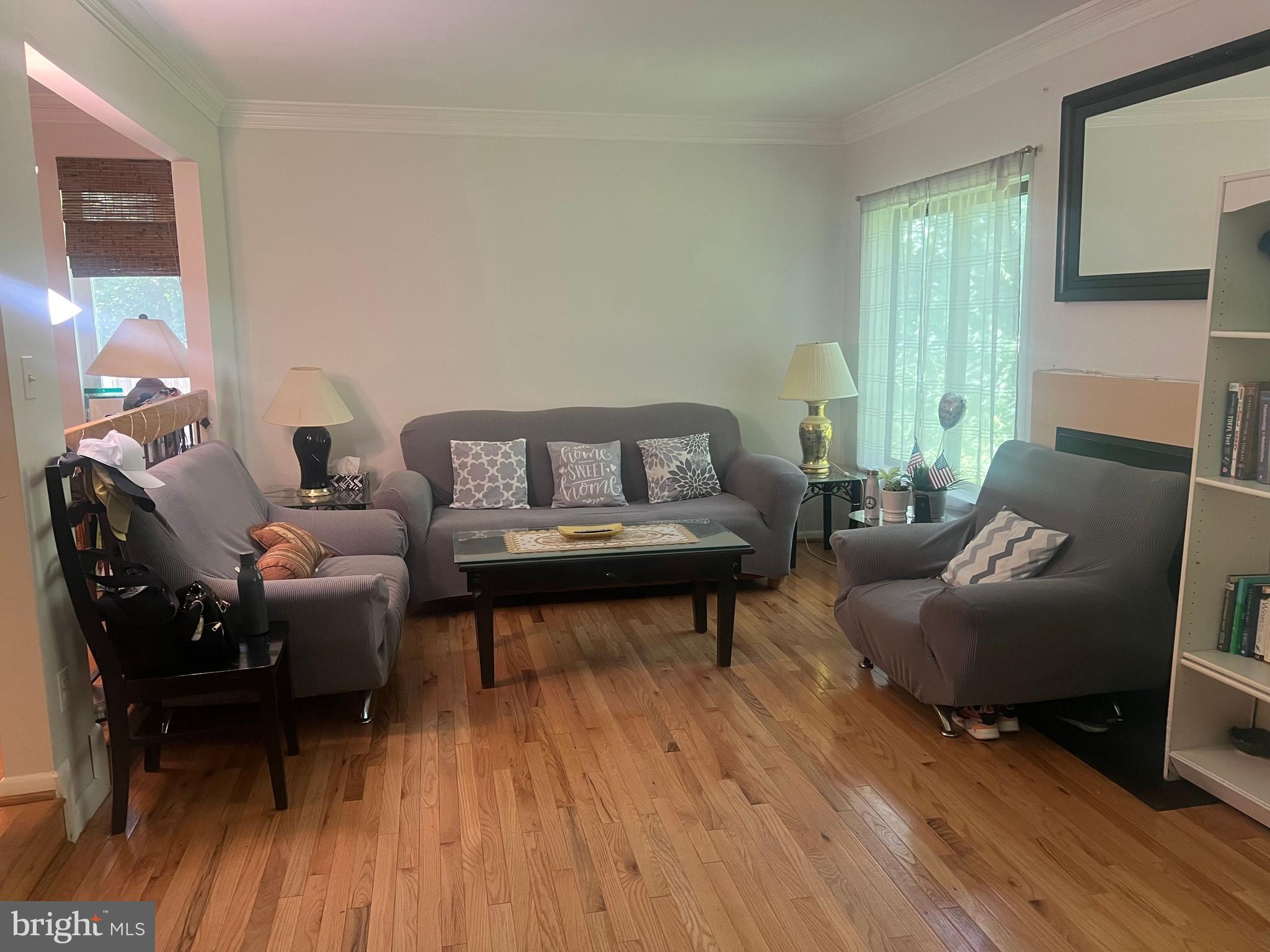 3723 Nimitz Road Kensington, MD 20895 - Photo 2 of 5 a living room with furniture and a wooden floor