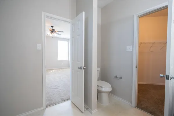 a bathroom with a toilet sink