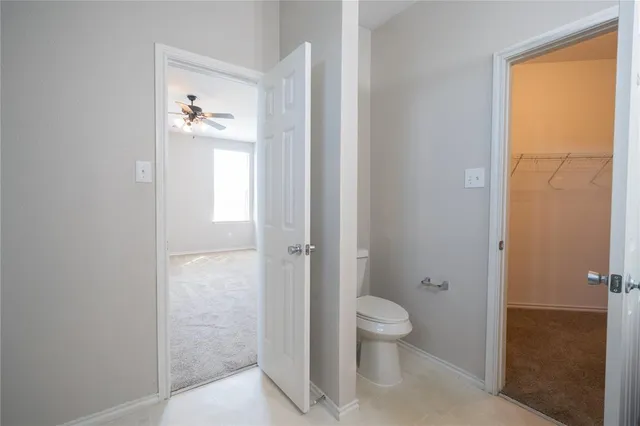 a bathroom with a toilet sink