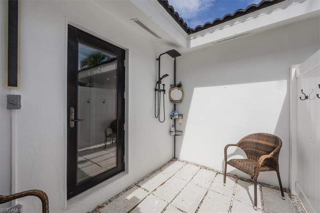 1570 Bonita Lane Naples, FL 34102 - Photo 13 of 22 a view of a hallway with elevator