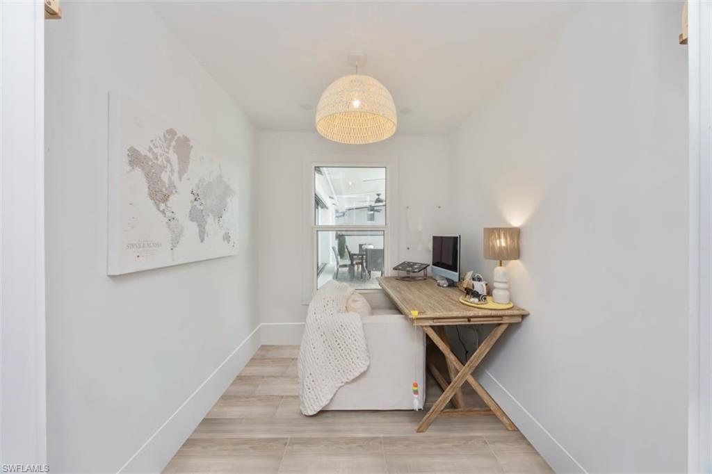 1570 Bonita Lane Naples, FL 34102 - Photo 18 of 22 a workspace with furniture and window