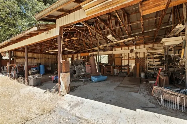 a view of a yard covered in snow