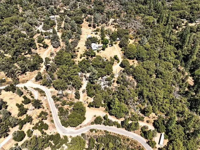 a view of a backyard of the house