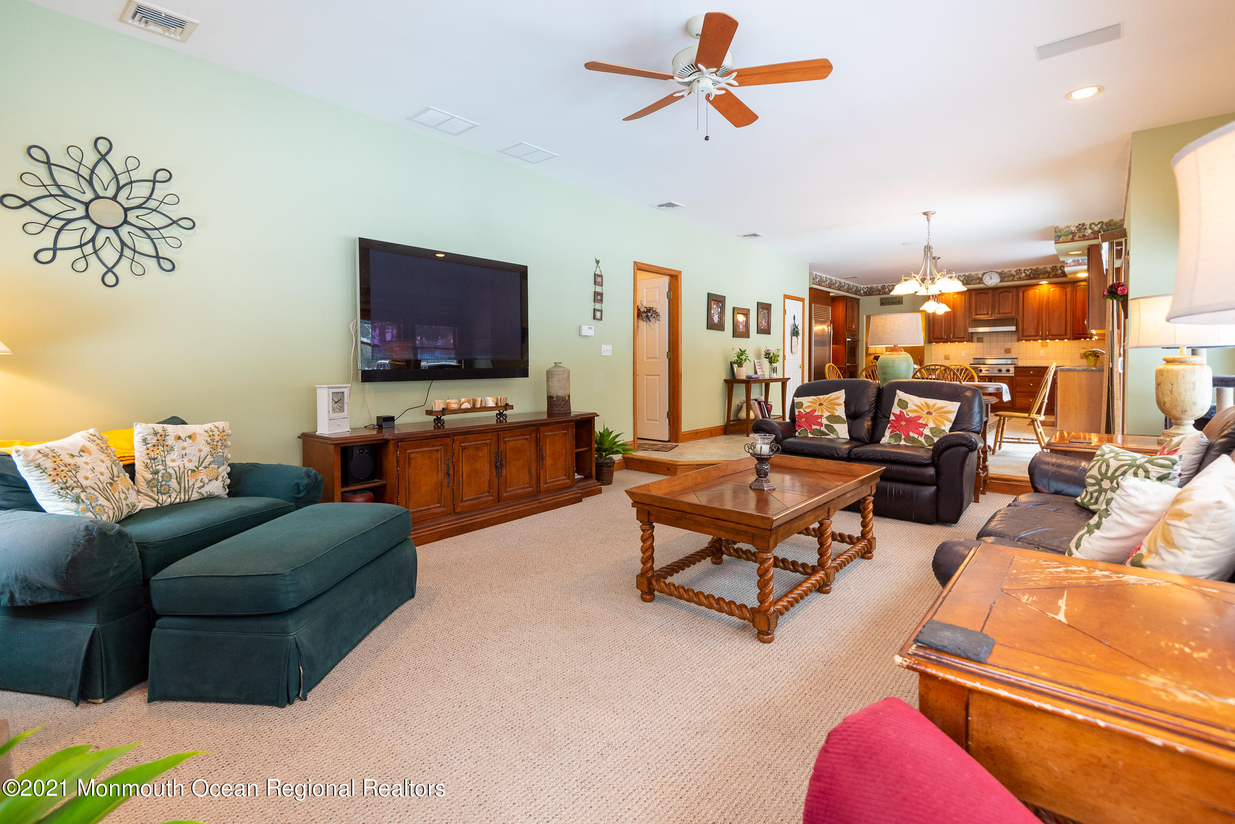 2100 Red Gate Road Allenwood, NJ 08720 - Photo 13 of 61 a living room with furniture and a flat screen tv