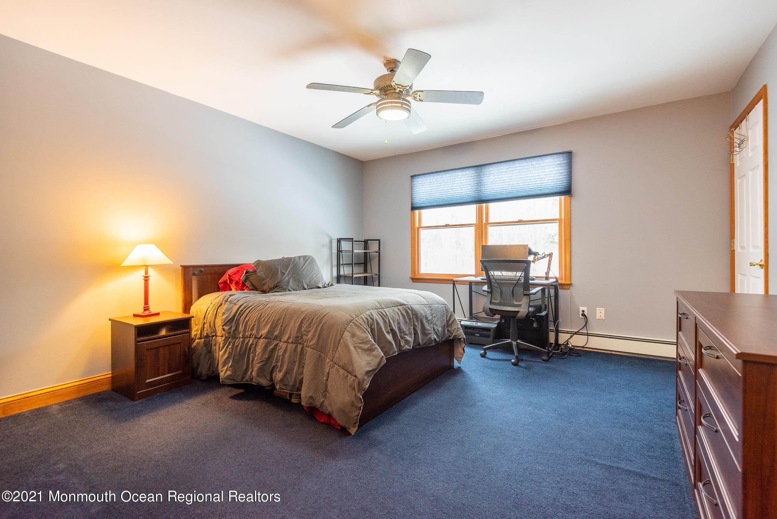 2100 Red Gate Road Allenwood, NJ 08720 - Photo 26 of 61 a spacious bedroom with a bed and a window