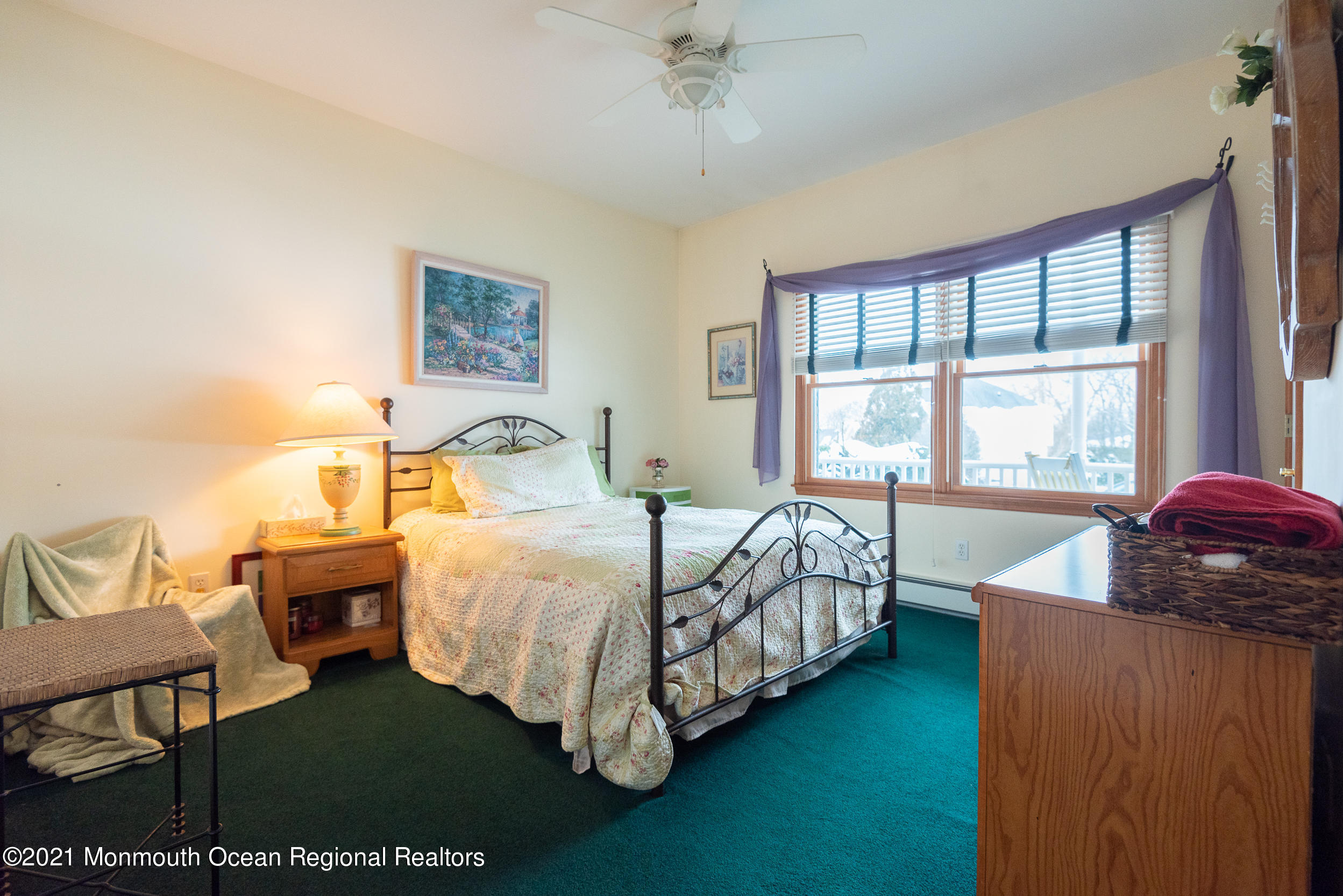 2100 Red Gate Road Allenwood, NJ 08720 - Photo 30 of 61 a bedroom with a bed and a large window