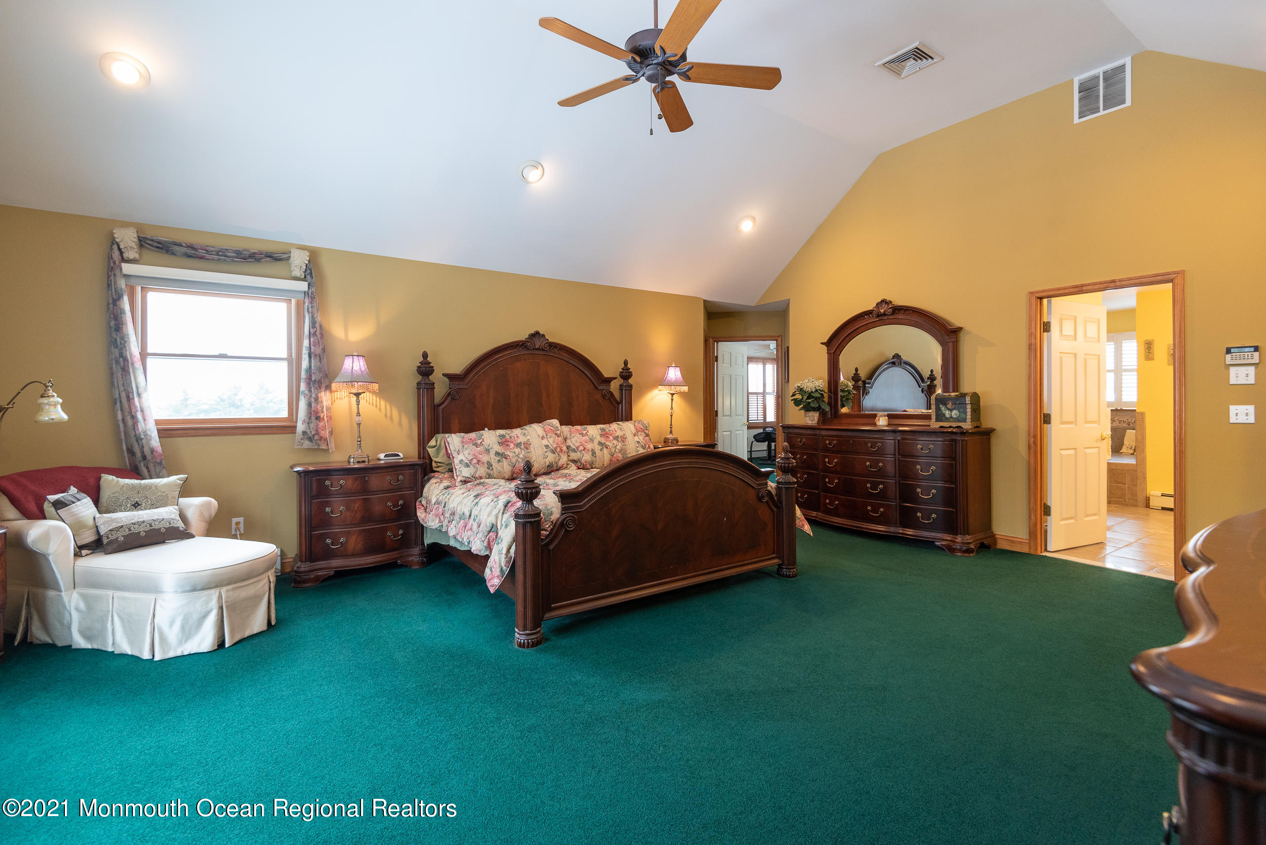 2100 Red Gate Road Allenwood, NJ 08720 - Photo 32 of 61 a bedroom with a bed and a couch