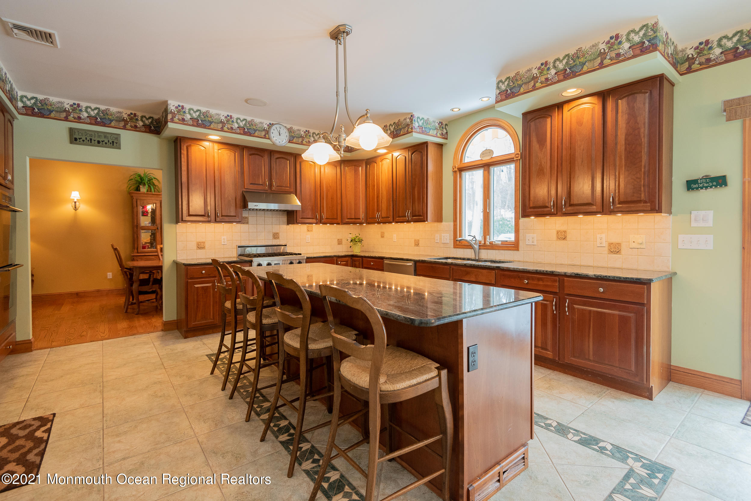 2100 Red Gate Road Allenwood, NJ 08720 - Photo 7 of 61 a view of a kitchen with kitchen island granite countertop wooden floor cabinets and stainless steel appliances
