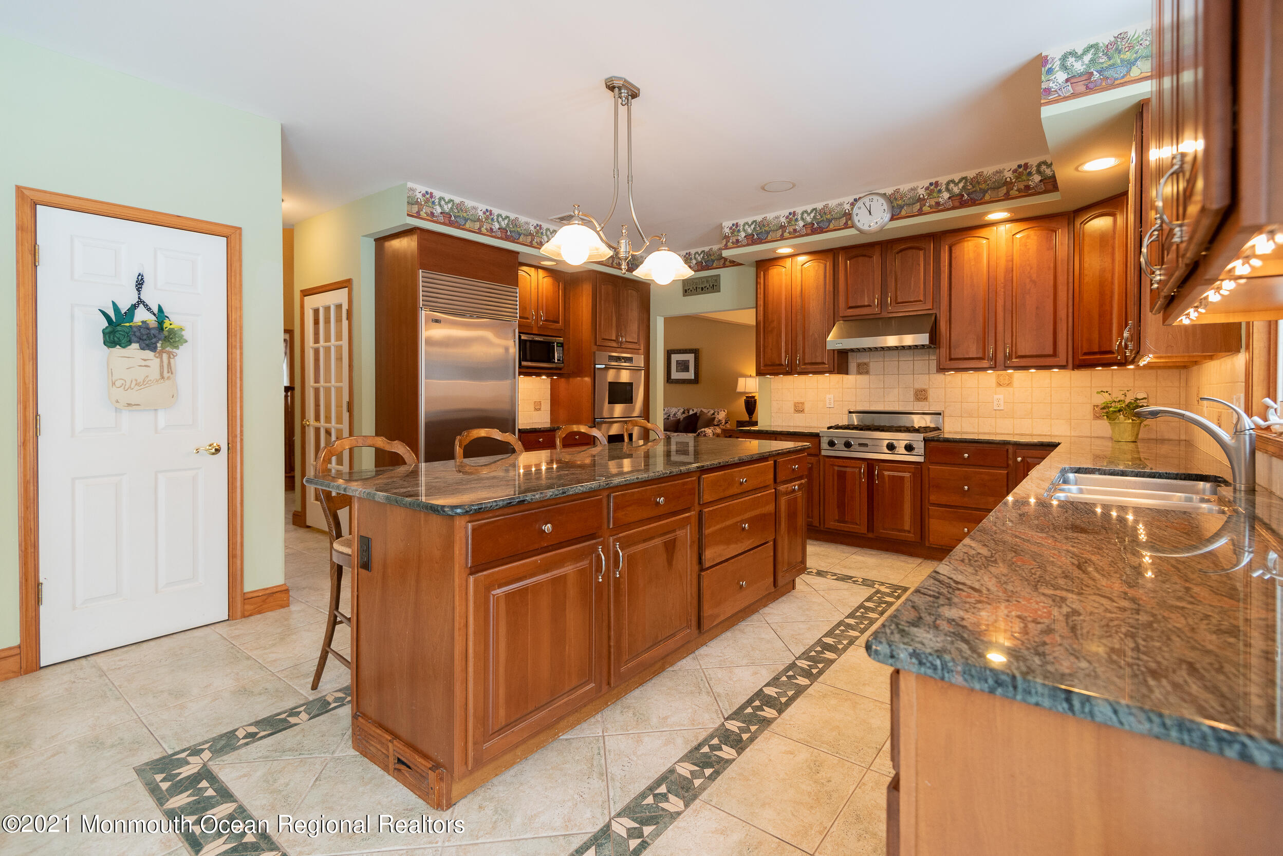 2100 Red Gate Road Allenwood, NJ 08720 - Photo 8 of 61 a kitchen with stainless steel appliances granite countertop a sink stove and cabinets