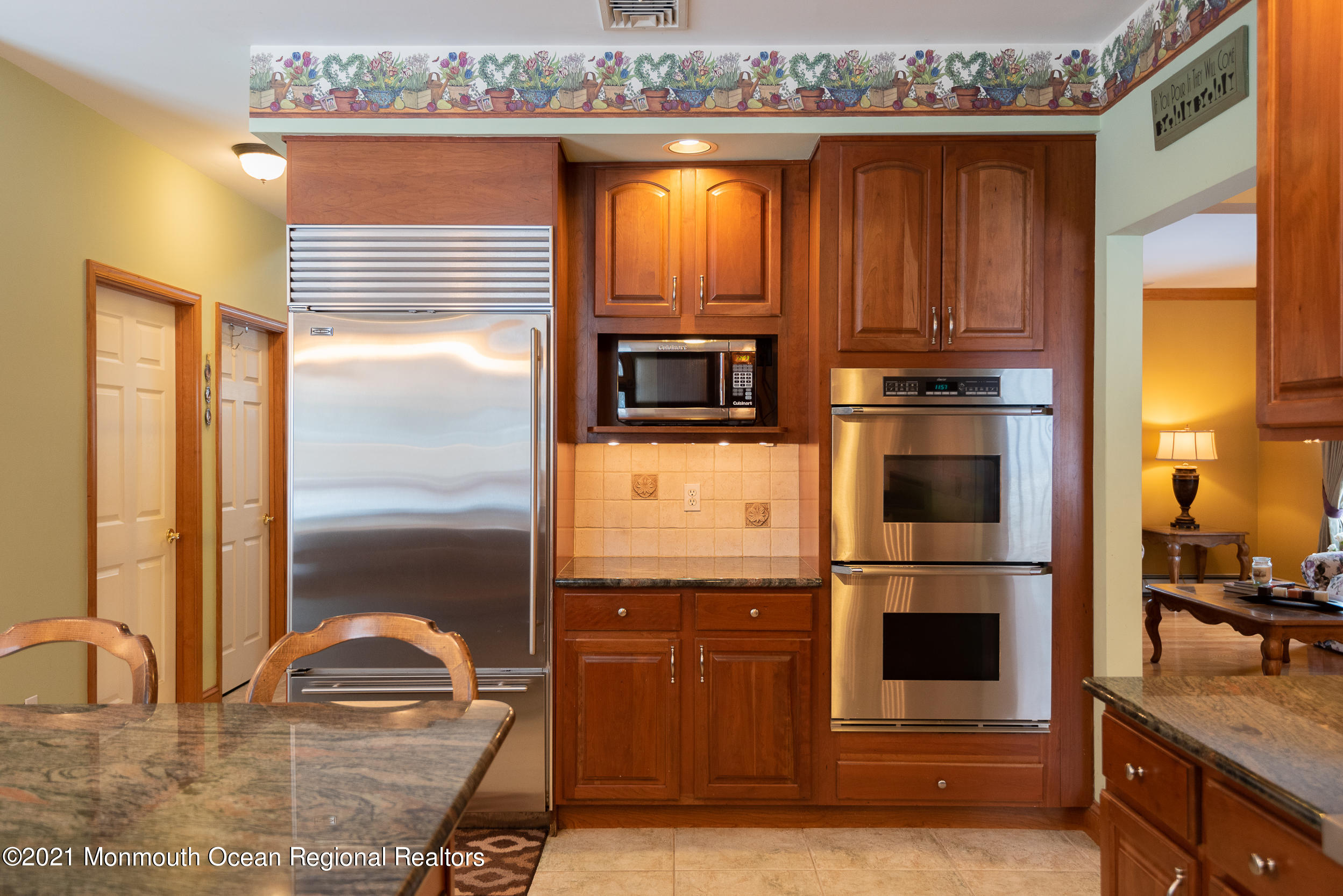 2100 Red Gate Road Allenwood, NJ 08720 - Photo 9 of 61 a kitchen with a refrigerator and a sink