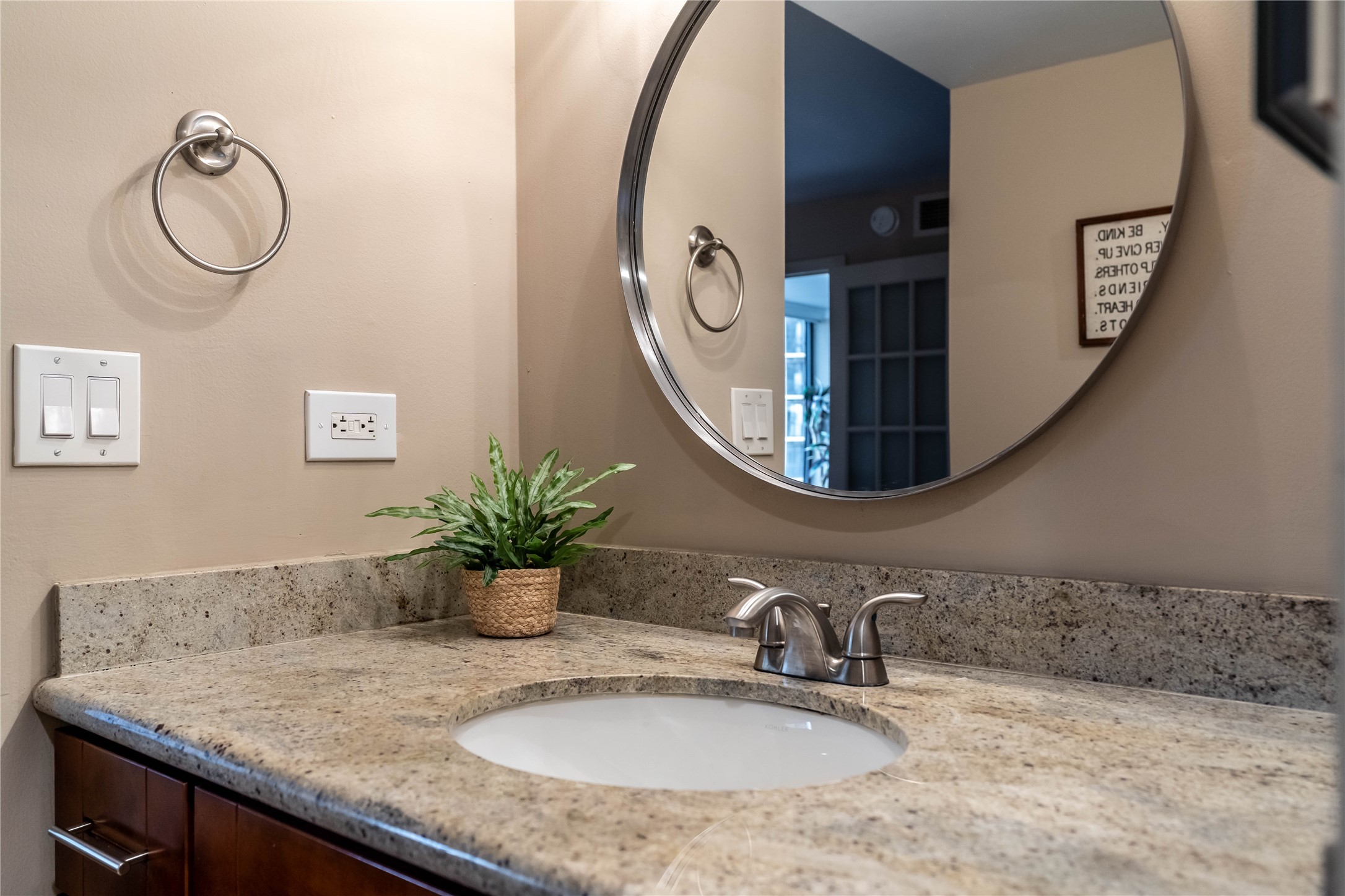 3525 Sage Road, Unit 1009 Houston, TX 77056 - Photo 11 of 23 a bathroom with a granite countertop sink and a mirror