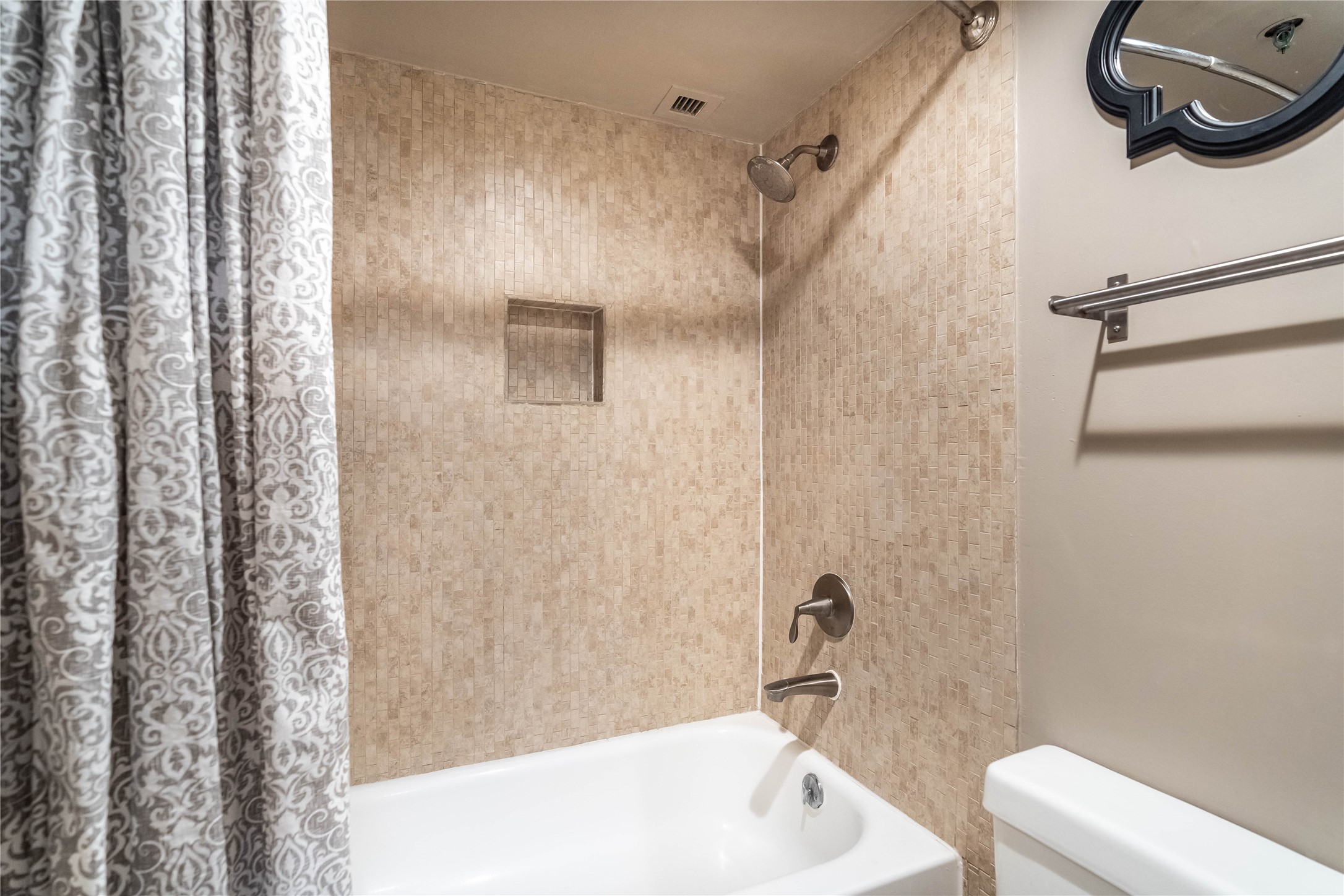 3525 Sage Road, Unit 1009 Houston, TX 77056 - Photo 12 of 23 a bathroom with a sink a toilet and shower curtain