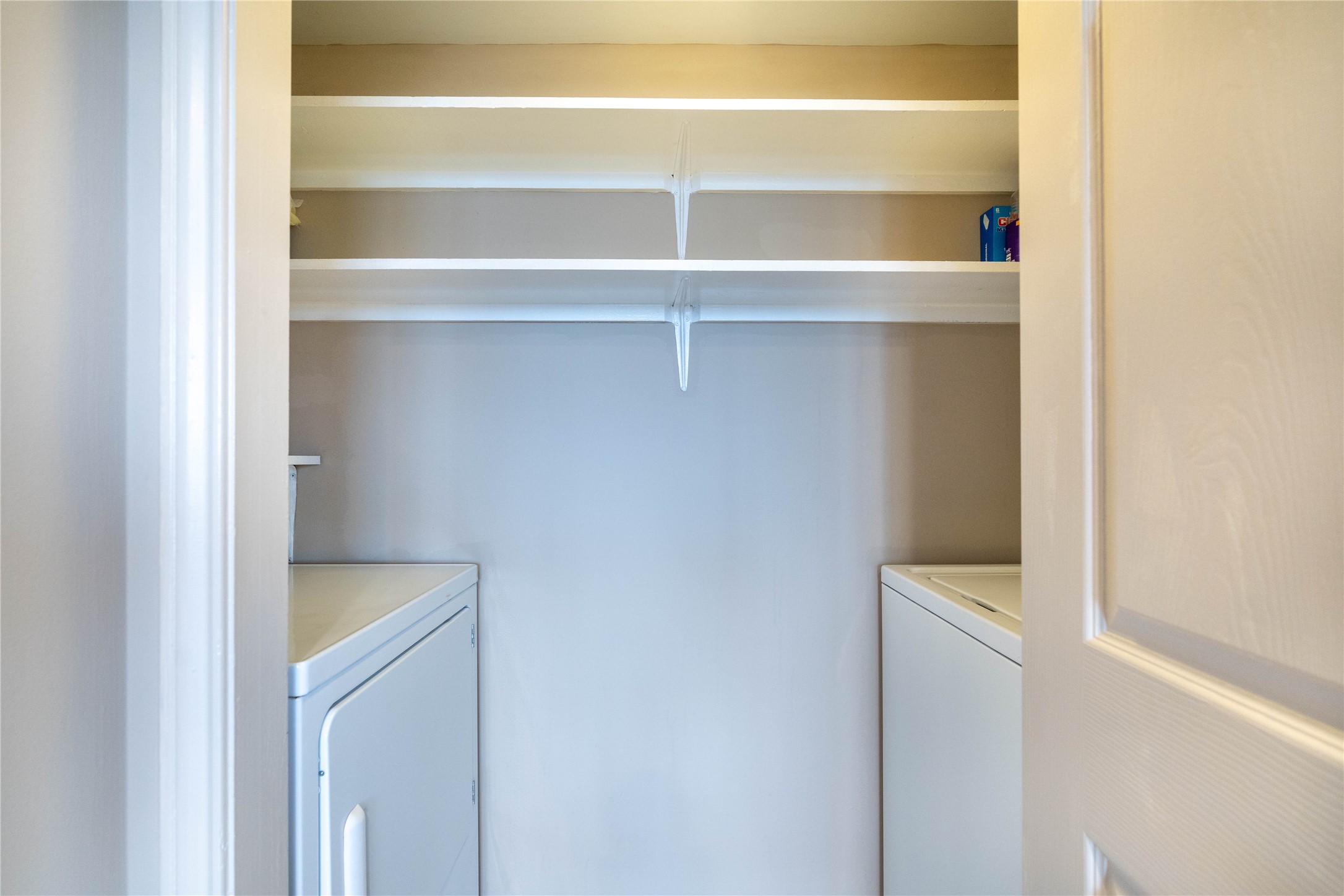 3525 Sage Road, Unit 1009 Houston, TX 77056 - Photo 7 of 23 a view of walk in closet with empty racks