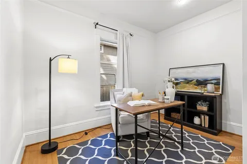 a view of a workspace with furniture