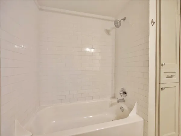 a bathroom with a bathtub