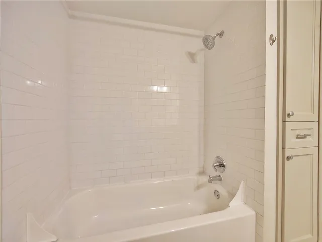 a bathroom with a bathtub