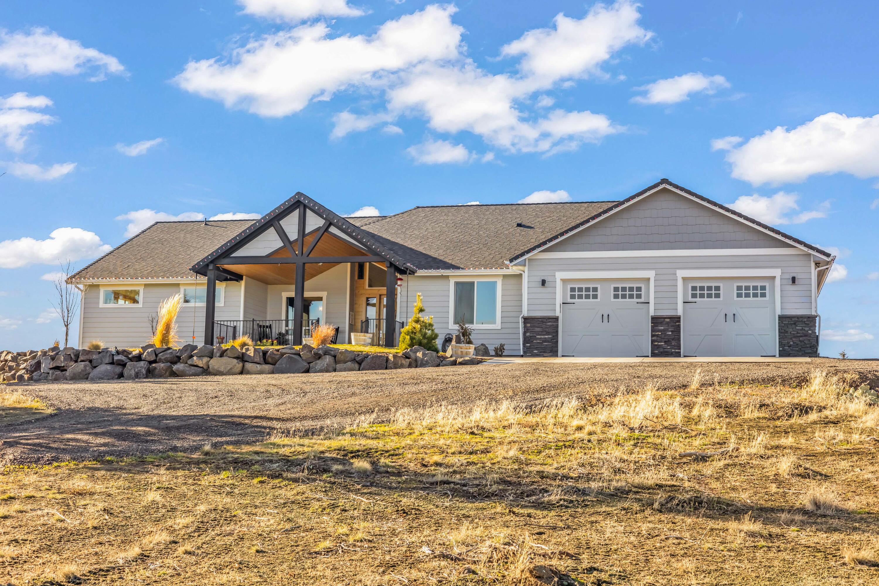 5582 North Mckay Road Prineville, OR 97754 - Photo 50 of 54 a front view of a house with a ocean view
