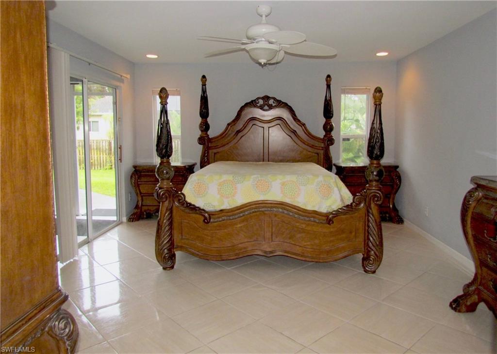 9124 Morris Road Fort Myers, FL 33967 - Photo 29 of 29 a bedroom with bed and window