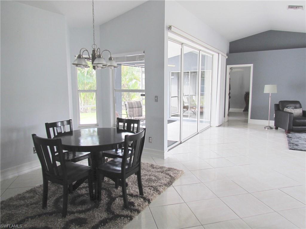 9124 Morris Road Fort Myers, FL 33967 - Photo 24 of 29 a view of a dining room with furniture and window
