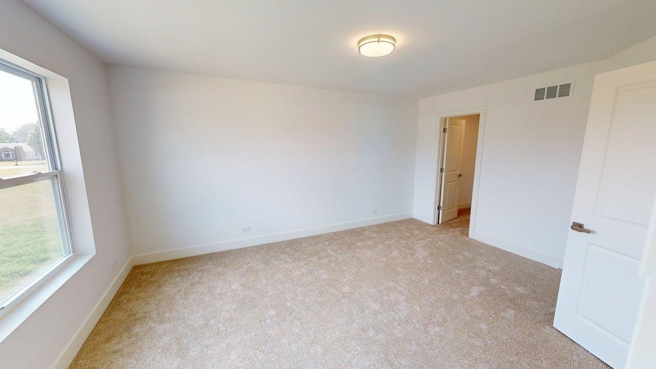 784 Cascade Place Marengo, IL 60152 - Photo 18 of 33 an empty room with windows