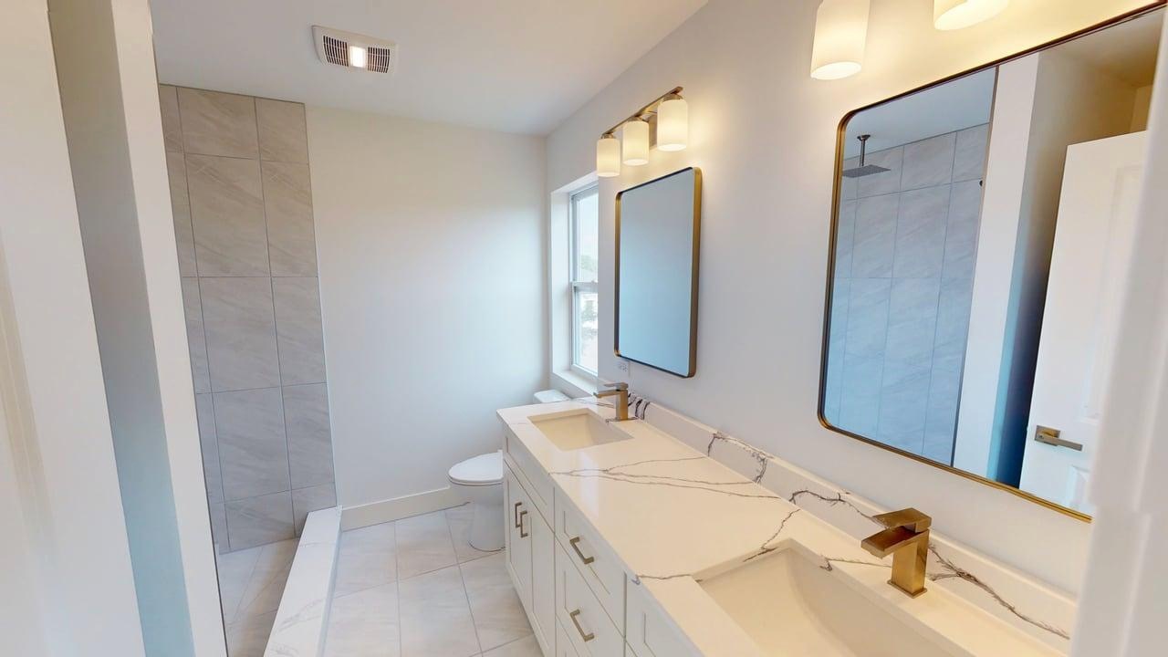 784 Cascade Place Marengo, IL 60152 - Photo 20 of 33 a bathroom with a sink and a mirror