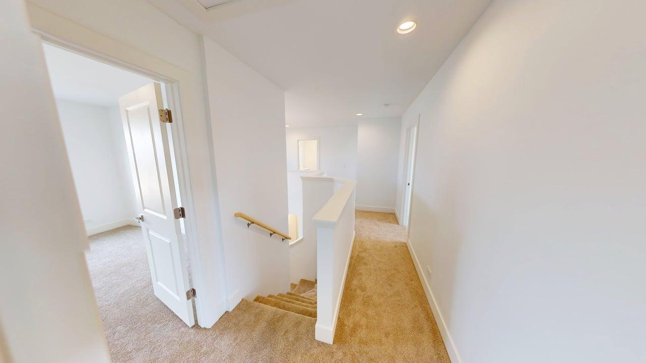 784 Cascade Place Marengo, IL 60152 - Photo 24 of 33 a view of a hallway with wooden floor and entryway