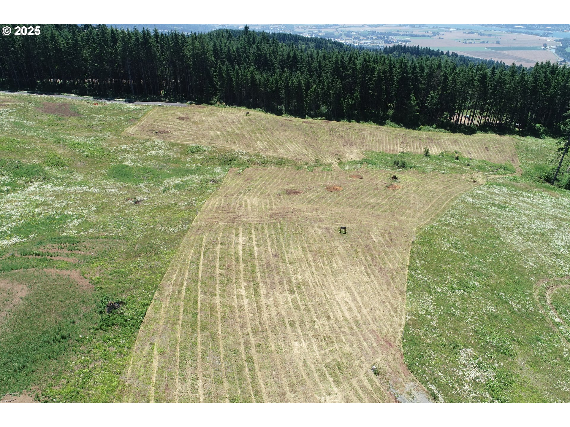 a swimming pool with wooden fence