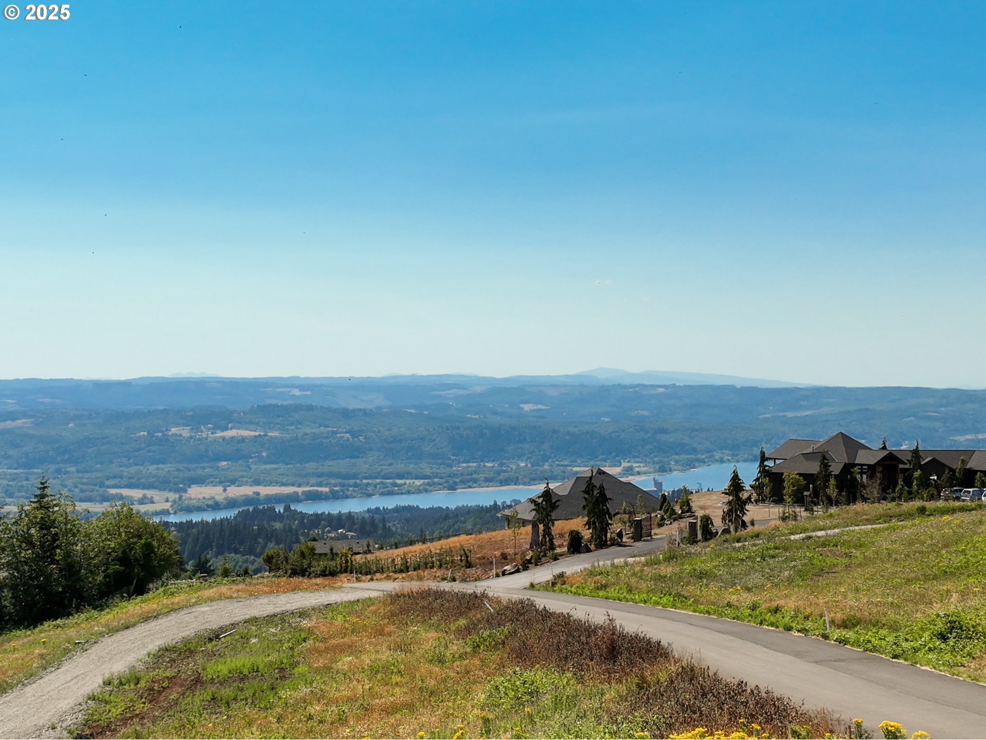 149 Resort Lane, Unit 1 Kalama, WA 98625 - Photo 11 of 12 an aerial view of residential houses with outdoor space