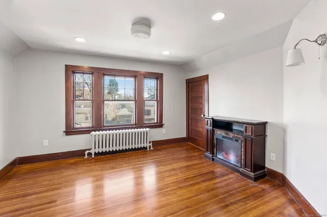wooden floor and windows in a room with a window