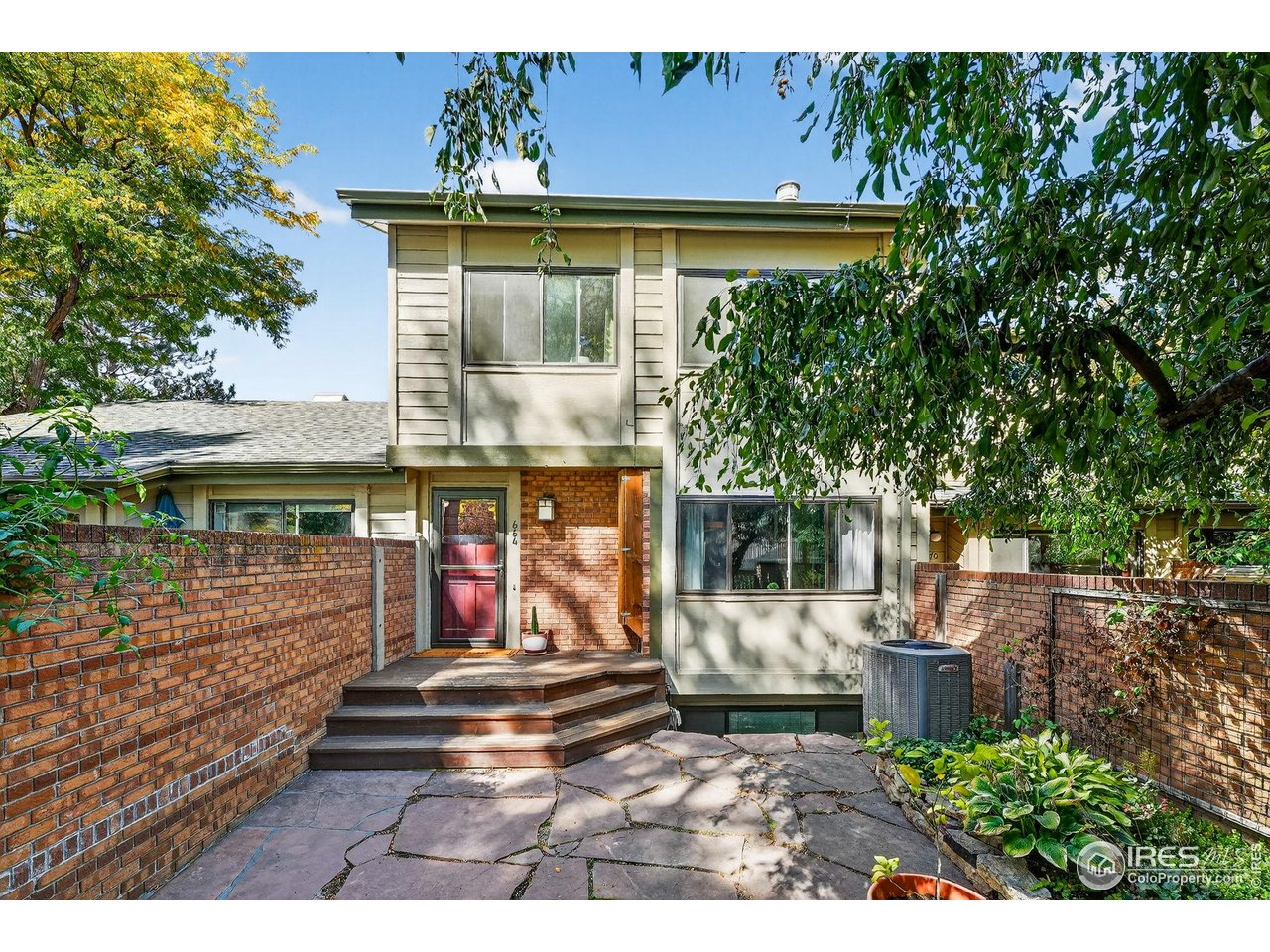 664 Quince Circle Boulder, CO 80304 - Photo 2 of 15 a view of a backyard with a patio