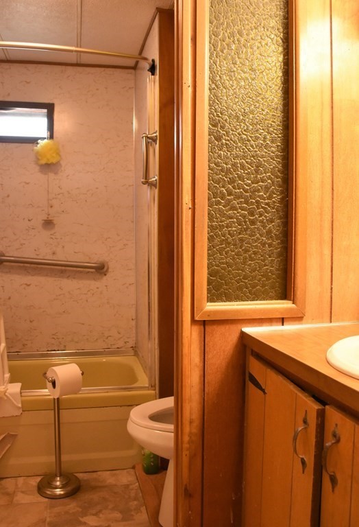 67 Breezy Lane Thompson, CT 06262 - Photo 12 of 17 a bathroom with a sink a toilet and shower