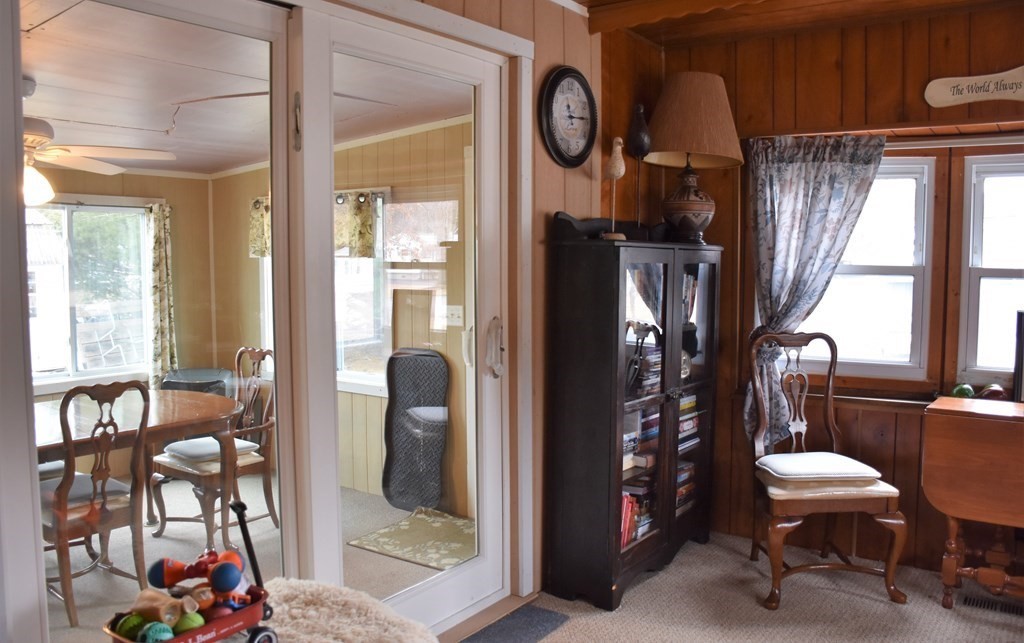 67 Breezy Lane Thompson, CT 06262 - Photo 6 of 17 a view of a entryway door and dining room