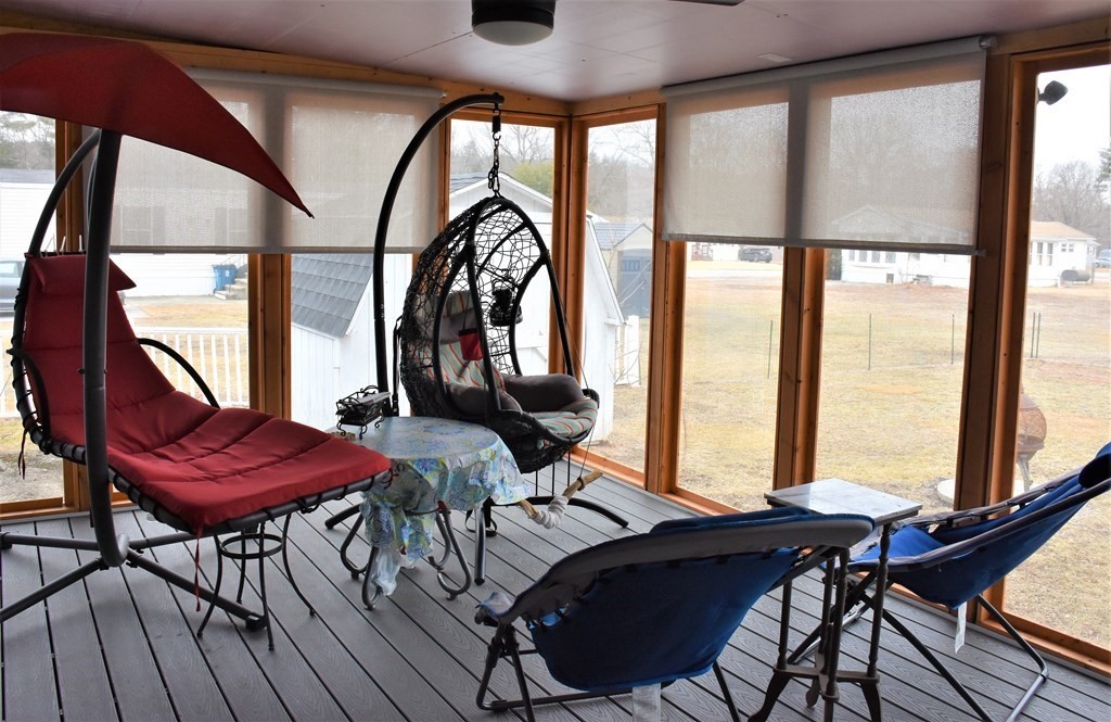 67 Breezy Lane Thompson, CT 06262 - Photo 10 of 17 a view of a dining room with furniture window and outside view