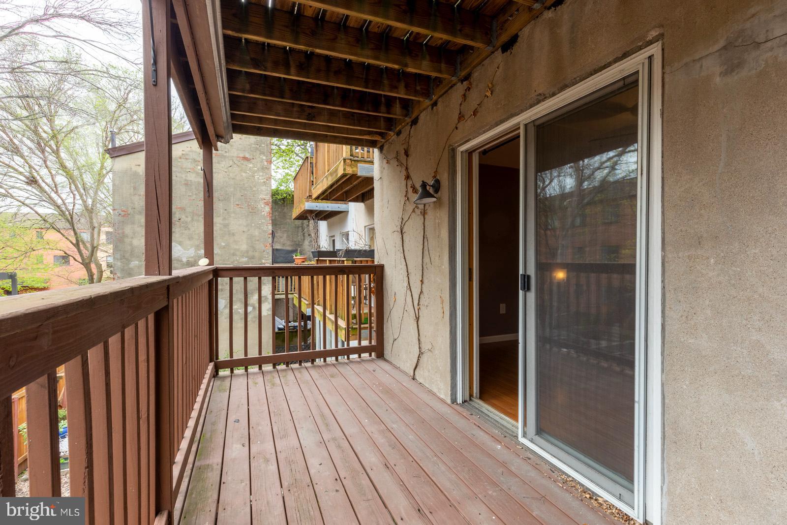 1120 Rodman Street, Unit 2 Philadelphia, PA 19147 - Photo 15 of 18 a view of balcony with wooden floor