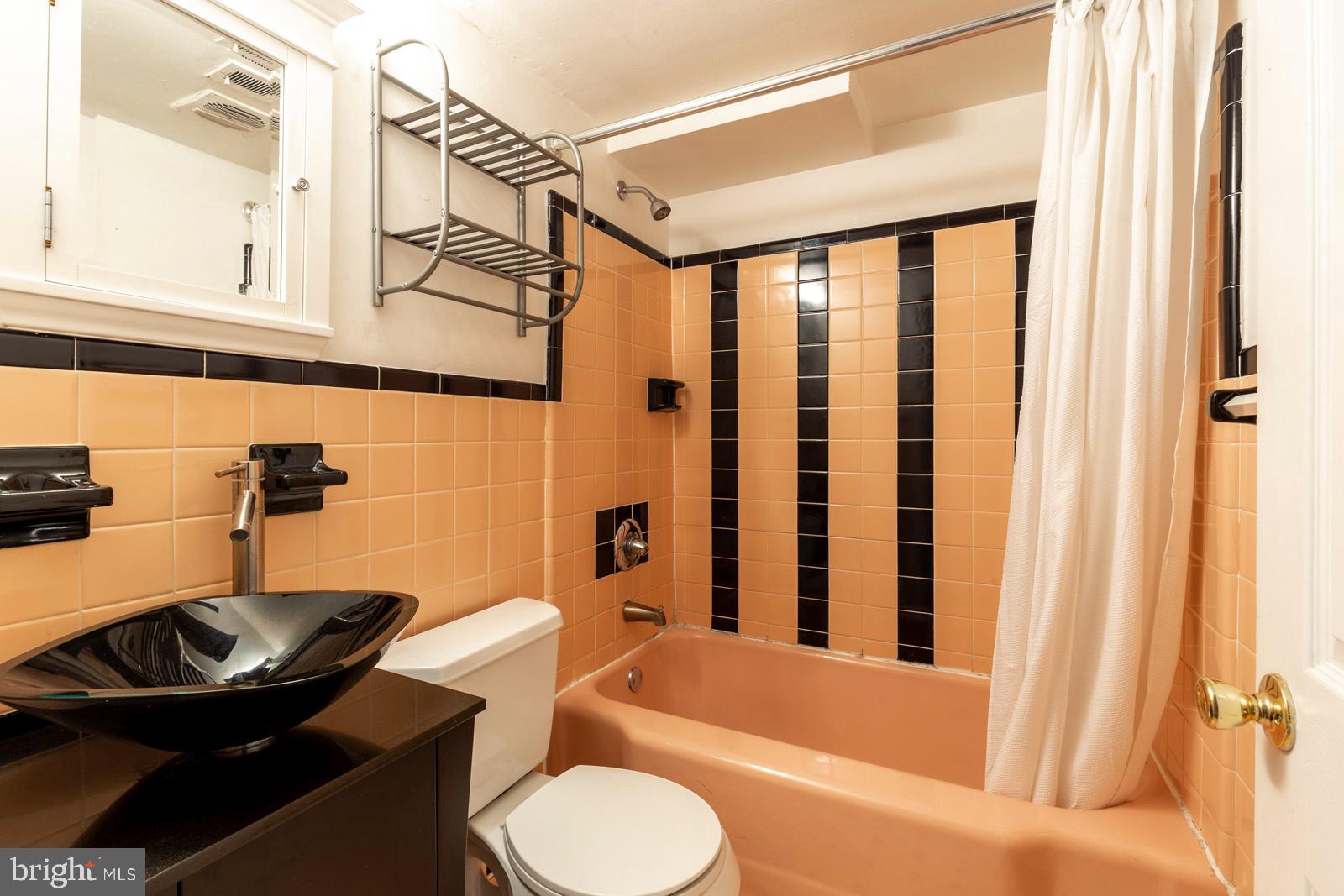 1120 Rodman Street, Unit 2 Philadelphia, PA 19147 - Photo 9 of 18 a bathroom with a sink toilet and shower