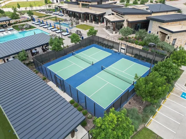 an aerial view of a house with a garden