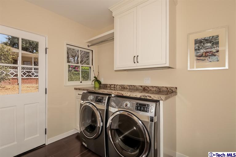 1963 New York Drive Altadena, CA 91001 - Photo 11 of 38 a utility room with dryer and washer
